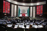 Momentos en que la votación electrónica se lleva a cabo en el pleno.